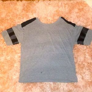 Mostly gray oversized t-shirt.